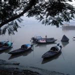 Boats neat the river bank